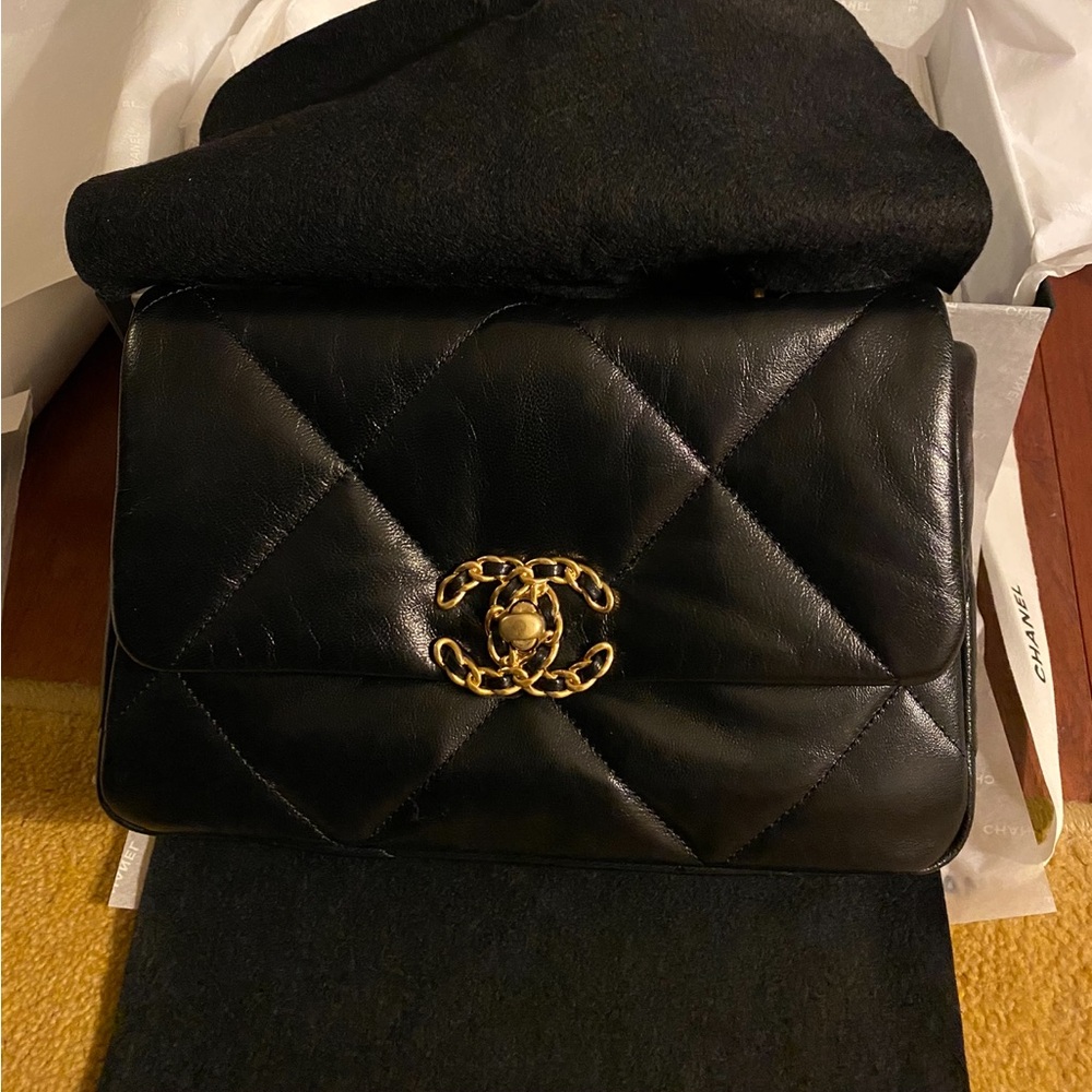 CHANEL Black Crossbody Bag with Gold Accents